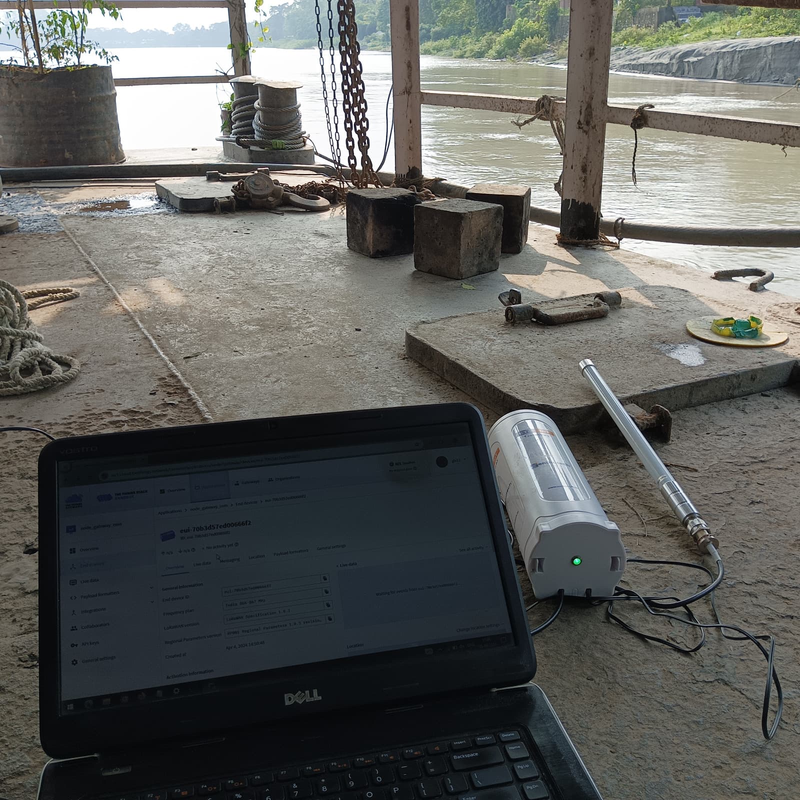 Field testing at river site with laptop and ultrasonic sensor